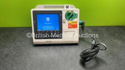 Philips Heartstart XL+ Defibrillator Including ECG and Printer Options with 1 x Paddle Lead and 1 x Battery (Powers Up) *SN US31410942*