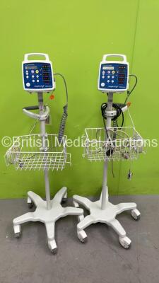 2 x CSI Criticare Comfort Cuff 506N3 Patient Monitors on Stands (Both Power Up) *S/N 114057398 / 312728580*