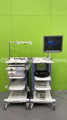 2 x Olympus Stack Trolleys with Olympus OEV191H Monitor, Olympus Evis Lucera CV-260SL Digital Processor, Olympus Evis Lucera CLV-260SL Light Source, Sony UP-21MD Colour Video Printer, Sony UP-55MD Colour Video Printer, Olympus ECS-260 Connector Cable and 