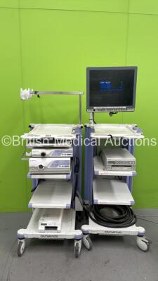 2 x Olympus Stack Trolleys with Olympus OEV191H Monitor, Olympus Evis Lucera CV-260SL Digital Processor, Olympus Evis Lucera CLV-260SL Light Source, Sony UP-25MD Colour Video Printer, Olympus ECS-260 Connector Cable and Olympus MAJ-1154 Pigtail Connector 