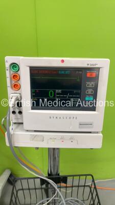 Mixed Lot Including Fukuda Denshi Dynascope DS-5100E Patient Monitor on Stand, 1 x Fukuda Denshi Dynascope DS-7100 Patient Monitor on Stand and 1 x Regulator on Stand (Both Power Up) *S/N 09070065 / 500000449* - 3