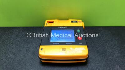 Medtronic Physio-Control Lifepak 1000 Defibrillator *Software Version 2.50 - Mfd 2015* with 1 x Battery (Powers Up) *SN 43286662*