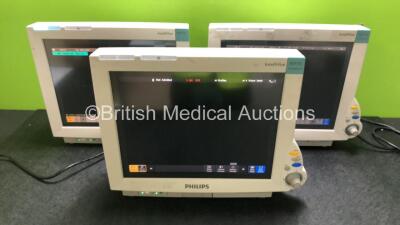 3 x Philips IntelliVue MP70 Patient Monitors (All Power Up) *SN DE843A2474 / DE73173439 / DE61749633*