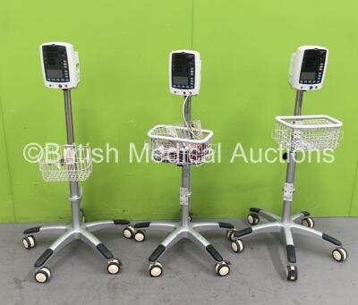 3 x Mindray VS-800 Vital Signs Monitors on Stands with Selection of Cables (All Power Up - 3 x Damaged Light Cases - See Pictures) *S/N BY36145771 / BY78101445 / BY78101439*