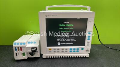 Datex Ohmeda Compact Anesthesia Patient Monitor with 1 x GE E-PRESTN Module Including ECG, SpO2, NIBP, T1, T2, P1 and P2 Options and 1 x GE E-CAiOV Gas Module Including Spirometry Options with D-fend Water Trap (Powers Up with Missing Dial-See Photo) *SN 