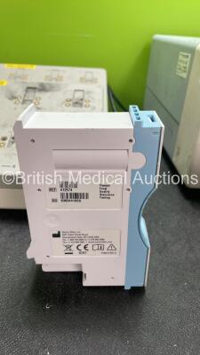 Mixed Lot Including 1 x Fines Electrosurgery Smoke Evacuation Unit (Powers Up) 1 x Welch Allyn Ref 412574 NIBP Module, 2 x Welch Allyn Ref 405672 NIBP Modules and 2 x Philips REF 865220 Battery Chargers (Both Power Up with Missing Parts-See Photos) *SN DE - 4