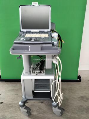 Ge Logiq E Portable Ultrasound Scanner *Mfd - Nov 2011* Software Version - R6.0.3 with 2 x Transducers / Probes (1 x 12L and 1 x 4C) on Docking Cart (Powers Up) *215322WX9* (Collection from Geldermalsen 4191, Netherlands Only)