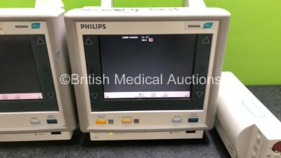 Job Lot Including 2 x Philips M3046A Patient Monitors (Both Power Up 1 x with Missing Module Clip - See Photo) and 2 x Philips M3001A Modules Including ECG, SpO2, NBP, Press and Temp Options - 3