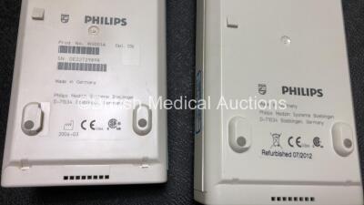 Job Lot Including 2 x Philips M3046A Patient Monitors (Both Power Up 1 x with Missing Module Clip - See Photo) and 2 x Philips M3001A Modules Including ECG, SpO2, NBP, Press and Temp Options - 7