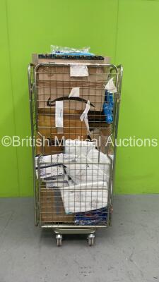 Cage of Consumables Including Coveralls, Overshoes and Gowns (Cage Not Included - Out of Date)