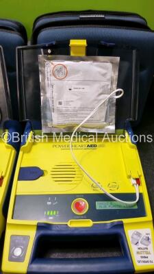 3 x Cardiac Science Powerheart AED G3 Automated External Defibrillators (All Power Up with Stock Battery Stock Battery Not Included) In Carry Case with 3 x In Date Electrode Packs - 2