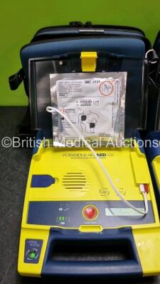 3 x Cardiac Science Powerheart AED G3 Automated External Defibrillators (All Power Up with Stock Battery Stock Battery Not Included) In Carry Case with 3 x In Date Electrode Packs - 4