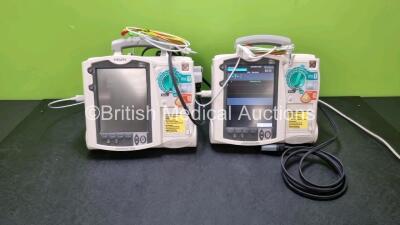 2 x Philips Heartstart MRx Defibrillators / Monitors (Both Power Up) Including ECG and Printer Options with 2 x Philips 3 Lead ECG Leads, 2 x Paddle Leads and 2 x