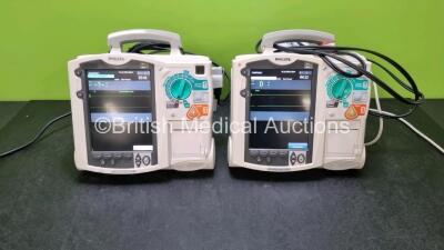 2 x Philips Heartstart MRx Defibrillators Including Pacer, ECG and Printer Options (Both Power Up) with 1 x M3725A Test and 2 x M3538A Modules