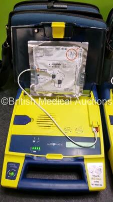 3 x Cardiac Science Powerheart AED G3 Automated External Defibrillators (All Power Up with Stock Battery Stock Battery Not Included) In Carry Case with 3 x In Date Electrode Packs - 4