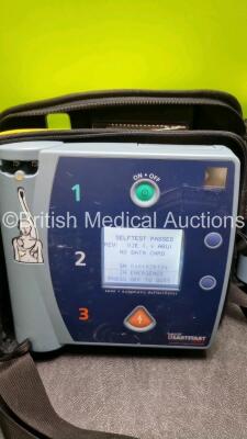 3 x Laerdal Heartstart FR2 Defibrillators (All Power Up with Stock Batteries, Batteries Not Included) In Carry Cases - 4