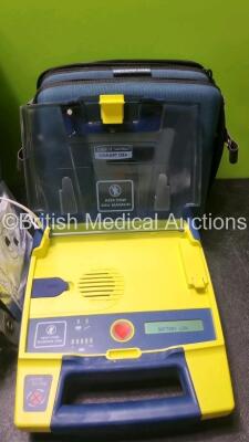 Job Lot Including 1 x Cardiac Science Powerheart AED G3 Automated External Defibrillator in Carry Case and 2 x Cardiac Science AED Trainers In Carry Case with 1 x Remote (All Power Up with Stock Batteries, Batteries Not Included) - 2