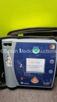 3 x Laerdal Heartstart FR2+ Defibrillators (All Power Up with Stock Batteries, Batteries Not Included) In Carry Cases - 3