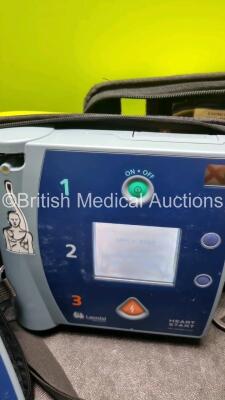 3 x Laerdal Heartstart FR2+ Defibrillators (All Power Up with Stock Batteries, Batteries Not Included) In Carry Cases - 4