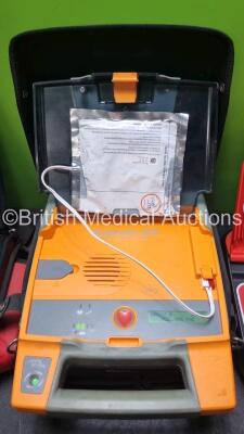 Job Lot Including 1 x Mediana Ref A15M-G4-0EH AED Defibrillator (Powers Up) 1 x Cardiac Science Responder Automated External Defibrillator In Carry Case (Powers Up with Stock Battery, Battery Not Included) and 1 x CU Medical Systems NF1200 Defibrillator I - 3