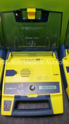 4 x Cardiac Science Powerheart AED G3 Automated External Defibrillators (All Power Up with Stock Batteries, Batteries Not Included, 1 x Requires Service) - 3