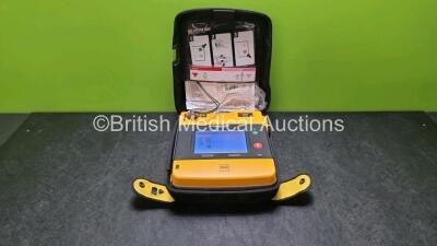 1 x Medtronic Physio Control Lifepak 1000 Defibrillator *Mfd 2011* (Powers Up)