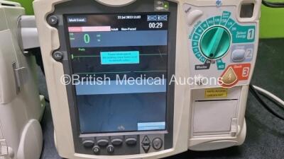 2 x Philips Heartstart MRx Defibrillators / Monitors Including ECG, and Printer Options (Both Power Up) with 2 x Paddle Leads, 1 x 3 Lead ECG Lead, 2 x Philips M3725A Test Loads, 1 x M3538A Battery and 1 x Philips M3539A Module - 2