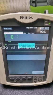 2 x Philips Heartstart MRx Defibrillators / Monitors Including ECG, and Printer Options (Both Power Up) with 2 x Paddle Leads, 1 x 3 Lead ECG Lead, 2 x Philips M3725A Test Loads, 1 x M3538A Battery and 1 x Philips M3539A Module - 3