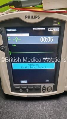 2 x Philips Heartstart MRx Defibrillators / Monitors Including ECG, and Printer Options (Both Power Up) with 2 x Paddle Leads, 1 x 3 Lead ECG Lead, 2 x Philips M3725A Test Loads, 1 x M3538A Battery and 1 x Philips M3539A Module - 5