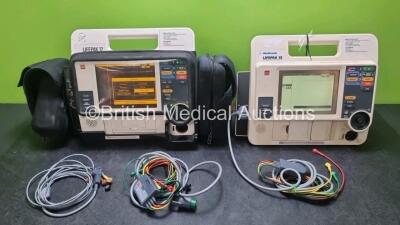 Job Lot Including 1 x Medtronic Lifepak 12 Biphasic Defibrillator *Mfd 2004* P/N VLP12-02-004437 (Powers Up and Passes Self Test) Including ECG, SpO2, NIBP Options with 1 x Ref 1111-000021 4 Lead ECG Lead, 2 x Batteries and 1 x Lifepak 12 Training Unit wi