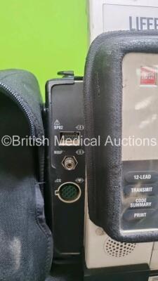 Job Lot Including 1 x Medtronic Lifepak 12 Biphasic Defibrillator *Mfd 2004* P/N VLP12-02-004437 (Powers Up and Passes Self Test) Including ECG, SpO2, NIBP Options with 1 x Ref 1111-000021 4 Lead ECG Lead, 2 x Batteries and 1 x Lifepak 12 Training Unit wi - 6