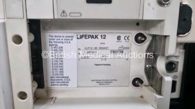 Job Lot Including 1 x Medtronic Lifepak 12 Biphasic Defibrillator *Mfd 2004* P/N VLP12-02-004437 (Powers Up and Passes Self Test) Including ECG, SpO2, NIBP Options with 1 x Ref 1111-000021 4 Lead ECG Lead, 2 x Batteries and 1 x Lifepak 12 Training Unit wi - 8