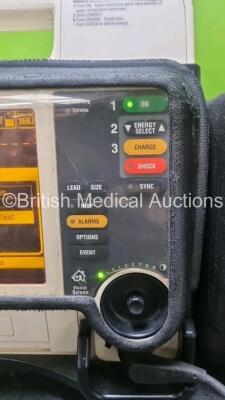 Medtronic Lifepak 12 Biphasic Defibrillator *Mfd 2008* P/N VLP12-02-007028 (Powers Up and Passes Self Test Slight Damage to Casing - See Photo) Including ECG, SpO2, NIBP Options with 1 x Ref 1111-000021 4 Lead ECG Lead, 1 x Ref 11111-000023 6 Lead ECG Lea - 4