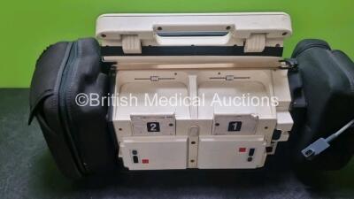 Medtronic Lifepak 12 Biphasic Defibrillator *Mfd 2008* P/N VLP12-02-007028 (Powers Up and Passes Self Test Slight Damage to Casing - See Photo) Including ECG, SpO2, NIBP Options with 1 x Ref 1111-000021 4 Lead ECG Lead, 1 x Ref 11111-000023 6 Lead ECG Lea - 8