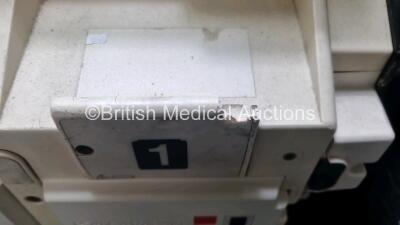 Medtronic Lifepak 12 Biphasic Defibrillator *Mfd 2008* P/N VLP12-02-007028 (Powers Up and Passes Self Test Slight Damage to Casing - See Photo) Including ECG, SpO2, NIBP Options with 1 x Ref 1111-000021 4 Lead ECG Lead, 1 x Ref 11111-000023 6 Lead ECG Lea - 9