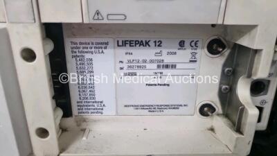 Medtronic Lifepak 12 Biphasic Defibrillator *Mfd 2008* P/N VLP12-02-007028 (Powers Up and Passes Self Test Slight Damage to Casing - See Photo) Including ECG, SpO2, NIBP Options with 1 x Ref 1111-000021 4 Lead ECG Lead, 1 x Ref 11111-000023 6 Lead ECG Lea - 10