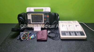 Job Lot Including 1 x Medtronic Lifepak 12 Biphasic Defibrillator / Monitor (Powers Up and Passes Self Test) Including Pacer, ECG, SpO2 and NIBP Options with 2 x Batteries, 1 x BP Cuff, 1 x BP Hose , 1 x Paddle Lead, 1 x 4 Lead ECG Lead in Carry Case an