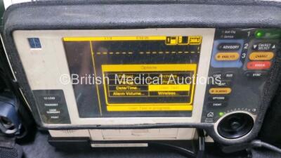 Medtronic Lifepak 12 Biphasic Defibrillator *Mfd 2004* P/N VLP12-02-004437 (Powers Up and Passes Self Test, Damage to Casing - See Photos) Including ECG, SpO2, NIBP Options with 1 x Ref 1111-000021 4 Lead ECG Lead, 1 x Ref 11111-000023 6 Lead ECG Lead, 2 - 2