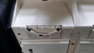 Medtronic Lifepak 12 Biphasic Defibrillator *Mfd 2004* P/N VLP12-02-004437 (Powers Up and Passes Self Test, Damage to Casing - See Photos) Including ECG, SpO2, NIBP Options with 1 x Ref 1111-000021 4 Lead ECG Lead, 1 x Ref 11111-000023 6 Lead ECG Lead, 2 - 9