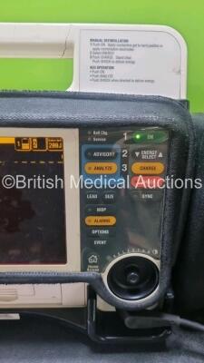 Medtronic Lifepak 12 Biphasic Defibrillator *Mfd 2002* P/N VLP12-02-003298 (Powers Up and Passes Self Test) Including ECG, SpO2, NIBP Options with 1 x Ref 1111-000021 4 Lead ECG Lead, 1 x Ref 11111-000023 6 Lead ECG Lead, 2 x Batteries, 1 x Paddle Lead, 1 - 7