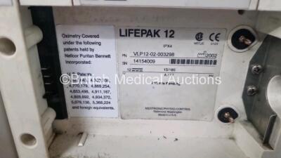 Medtronic Lifepak 12 Biphasic Defibrillator *Mfd 2002* P/N VLP12-02-003298 (Powers Up and Passes Self Test) Including ECG, SpO2, NIBP Options with 1 x Ref 1111-000021 4 Lead ECG Lead, 1 x Ref 11111-000023 6 Lead ECG Lead, 2 x Batteries, 1 x Paddle Lead, 1 - 9