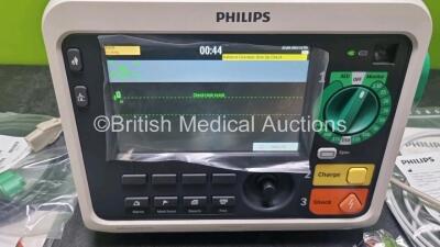 Philips Efficia DFM100 Defibrillator *Mfd 2020* (Powers Up) Including Pacer, ECG, CO2 and Printer Options with , 1 x Philips CO2 Sensor Module 1 x 3 Lead ECG Lead, 1 x Paddle Lead *SN CN32640149* - 2