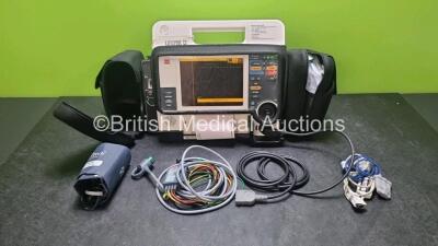 Medtronic Lifepak 12 Biphasic Defibrillator *Mfd 2007* P/N VLP12-02-006555 (Powers Up and Passes Self Test) Including ECG, SpO2, NIBP Options with 1 x Ref 1111-000021 4 Lead ECG Lead, 2 x Batteries, 1 x Paddle Lead, 1 x SpO2 Finger Sensor and 1 x BP Cuff 