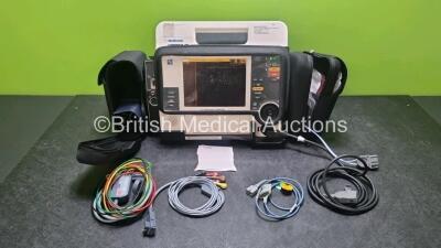 Medtronic Lifepak 12 Biphasic Defibrillator *Mfd 2007* P/N VLP12-02-007028 (Powers Up and Passes Self Test) Including ECG, SpO2, NIBP Options with 1 x Ref 1111-000021 4 Lead ECG Lead, 1 x Ref 11111-000023 6 Lead ECG Lead, 2 x Batteries, 1 x Paddle Lead, 1