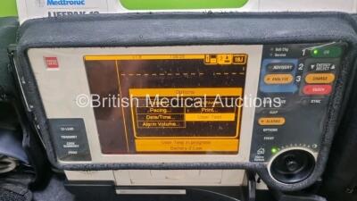 Medtronic Lifepak 12 Biphasic Defibrillator *Mfd 2007* P/N VLP12-02-006555 (Powers Up and Passes Self Test, Slight Damage to Casing - See Photos) Including ECG, SpO2, NIBP Options with 1 x Ref 1111-000021 4 Lead ECG Lead, 1 x Ref 11111-000023 6 Lead ECG L - 2