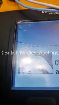 2 x Medtronic Physio Control Lifepak 1000 Defibrillators *Mfd 209 / 2011* (Both Power Up 1 x Crack In Screen - See Photo) with 2 x 3 Lead ECG Lead , 3 x in Date Electrode Packs and 3 x Physio Control 1000 Batteries *Li/Mn02* - 4