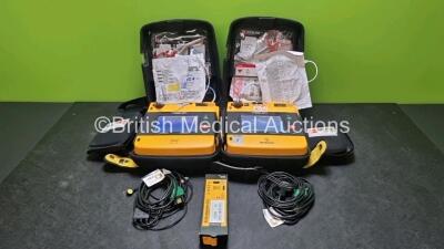 2 x Medtronic Physio Control Lifepak 1000 Defibrillators *Mfd 2008 / 2018* (Both Power Up) with 2 x 3 Lead ECG Lead , 3 x in Date Electrode Packs and 3 x Physio Control 1000 Batteries *Li/Mn02*