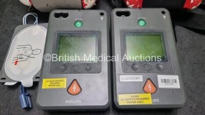 2 x Philips Heartstart FR3 Defibrillators (Both Power Up with Stock Battery, Stock Battery Not Included) In Carry Cases *SN C12F00389 / C12F00629* - 2