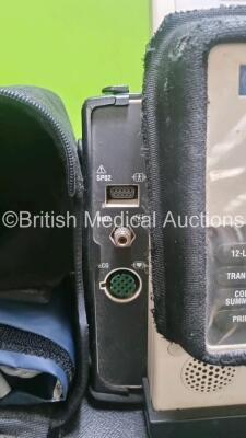 Medtronic Lifepak 12 Biphasic Defibrillator *Mfd 2004* P/N VLP12-02-004437 (Powers Up and Passes Self Test, Slight Damage to Casing - See Photos) Including ECG, SpO2, NIBP Options with 1 x Ref 1111-000021 4 Lead ECG Lead, 1 x Ref 11111-000023 6 Lead ECG L - 3