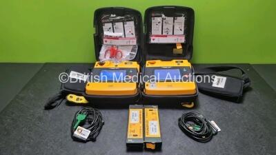 2 x Medtronic Physio Control Lifepak 1000 Defibrillators *Mfd 2021 / 20198 (Both Power Up) with 2 x 3 Lead ECG Lead and 4 x Physio Control 1000 Batteries *Li/Mn02*